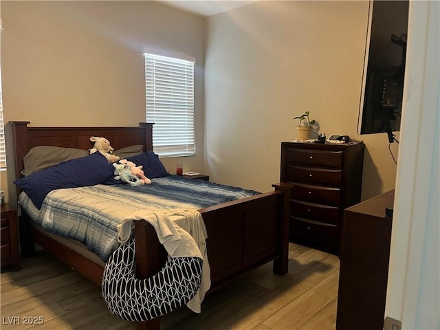 bedroom featuring light hardwood / wood-style flooring