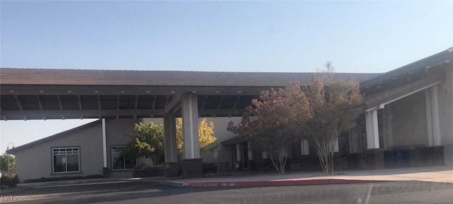 view of building exterior with a carport