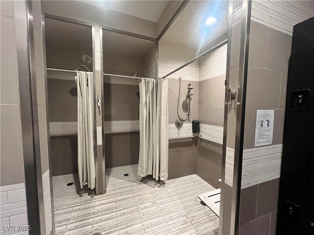 bathroom featuring a shower with curtain