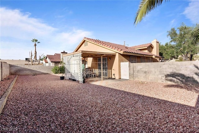 back of house featuring a patio