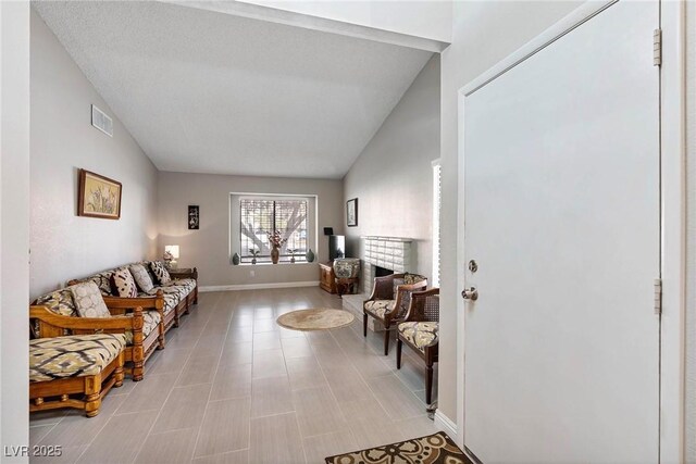 living room with vaulted ceiling