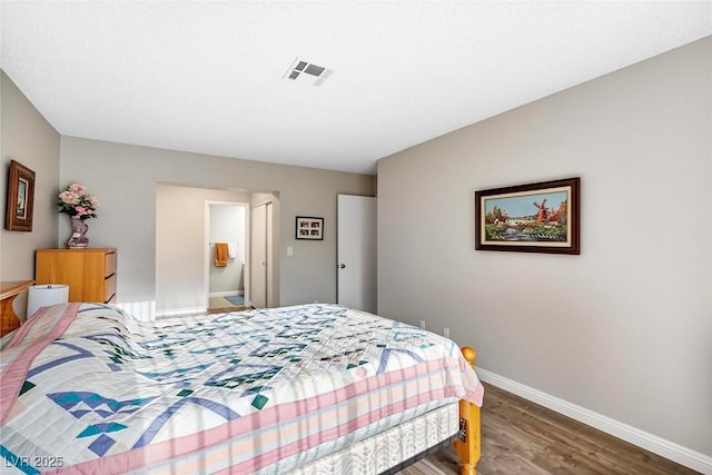 bedroom featuring hardwood / wood-style flooring