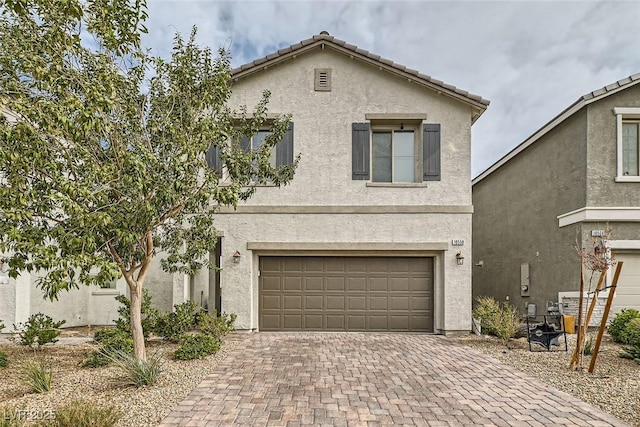 view of front of property featuring a garage