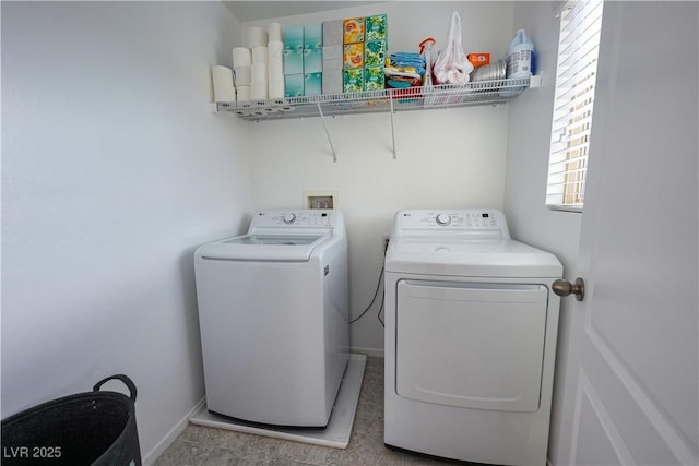 laundry area featuring independent washer and dryer