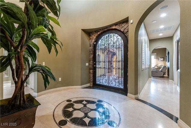 foyer with light tile patterned floors