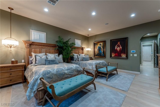 bedroom with light hardwood / wood-style flooring