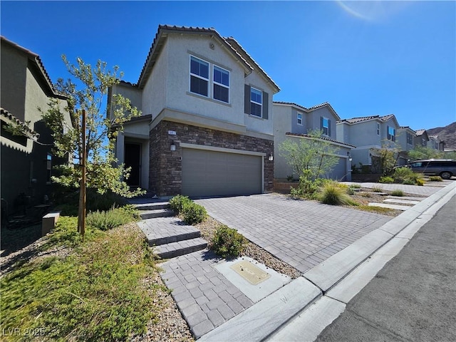 view of front of home with a garage