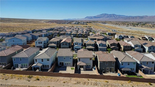 drone / aerial view featuring a mountain view