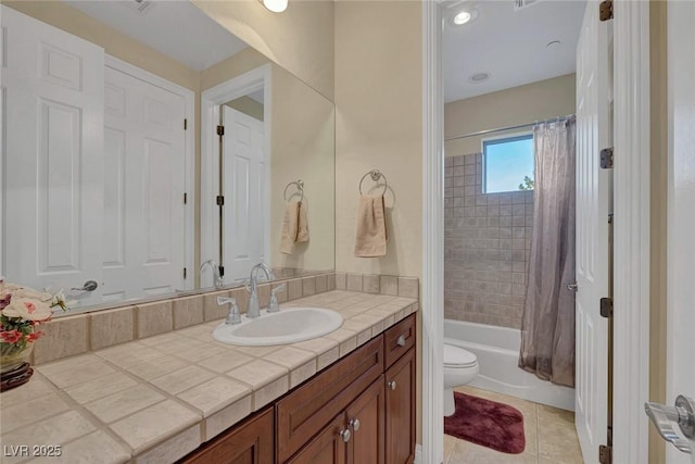 full bathroom with tile patterned flooring, vanity, shower / tub combo, and toilet