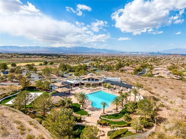 birds eye view of property featuring a mountain view