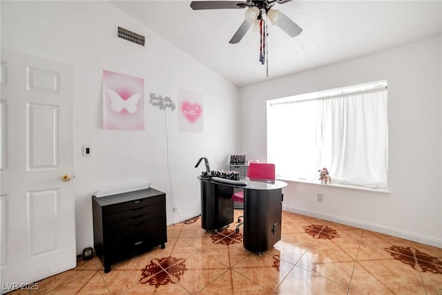 tiled office featuring a healthy amount of sunlight, ceiling fan, and lofted ceiling