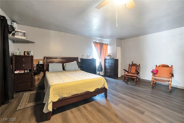 bedroom featuring ceiling fan and hardwood / wood-style floors