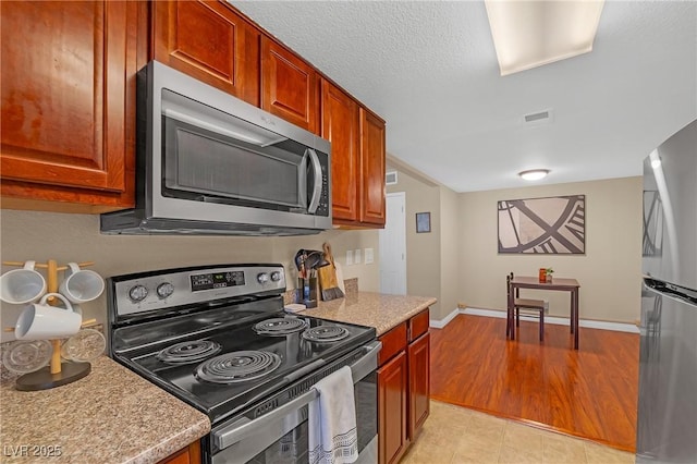 kitchen with appliances with stainless steel finishes