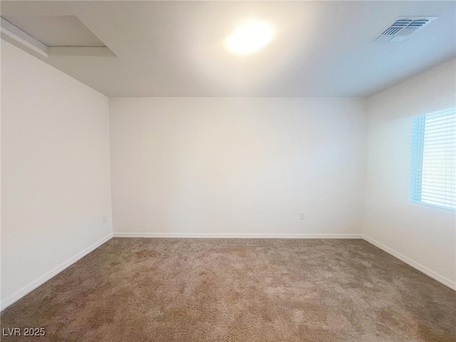 spare room with carpet flooring