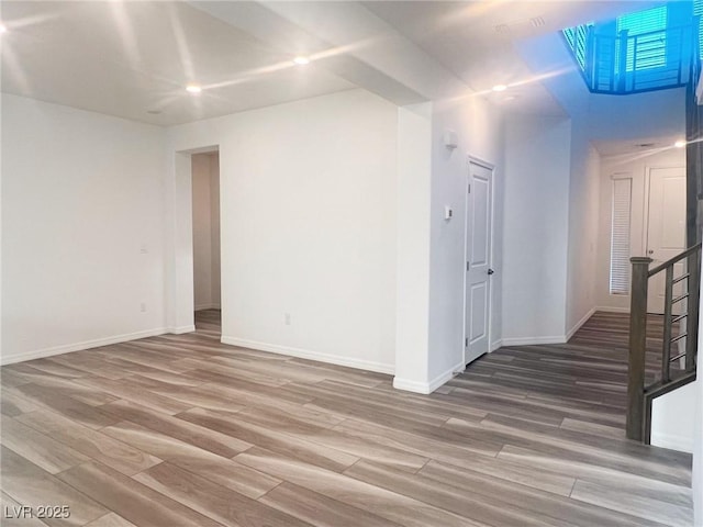 empty room featuring hardwood / wood-style flooring