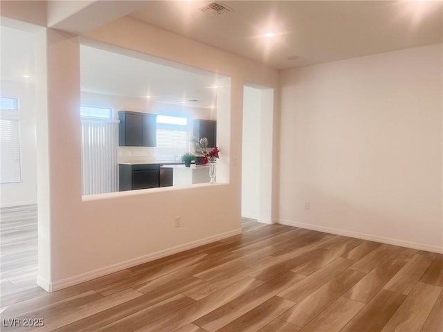 empty room featuring hardwood / wood-style floors