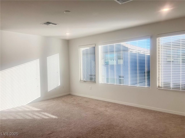 view of carpeted spare room