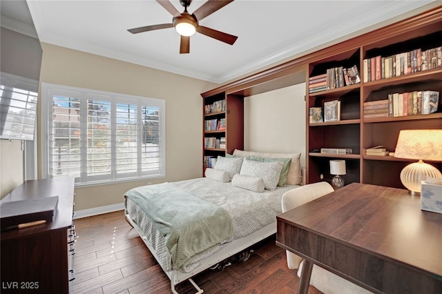 bedroom with crown molding, dark hardwood / wood-style floors, and ceiling fan