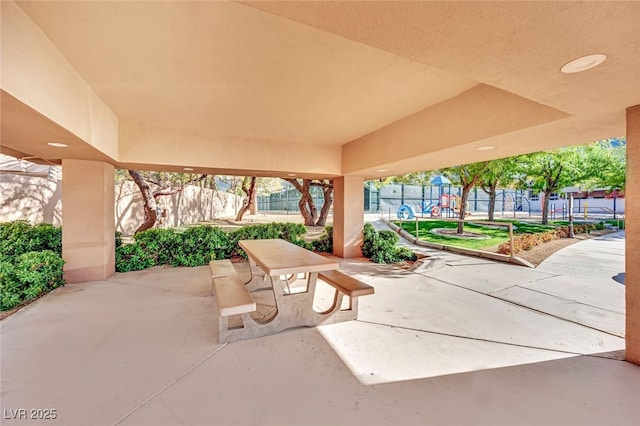 view of patio featuring a playground