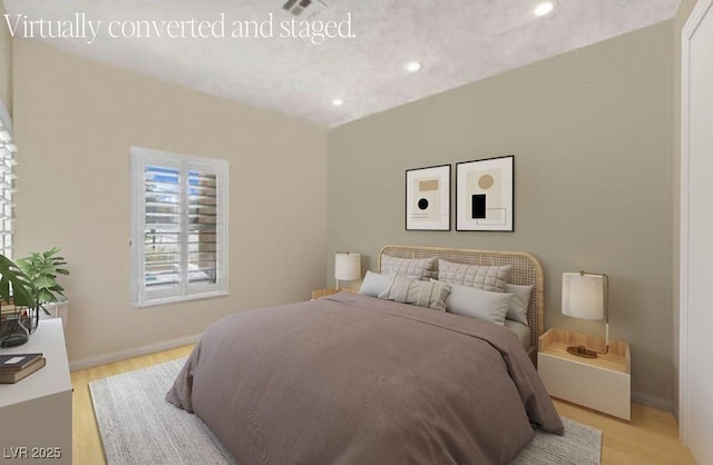 bedroom featuring light hardwood / wood-style flooring