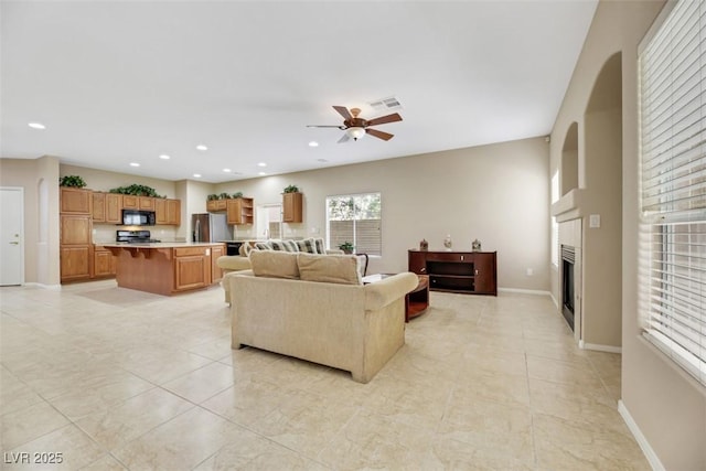 living room with ceiling fan