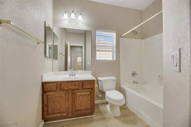 full bathroom with shower / washtub combination, vanity, and toilet