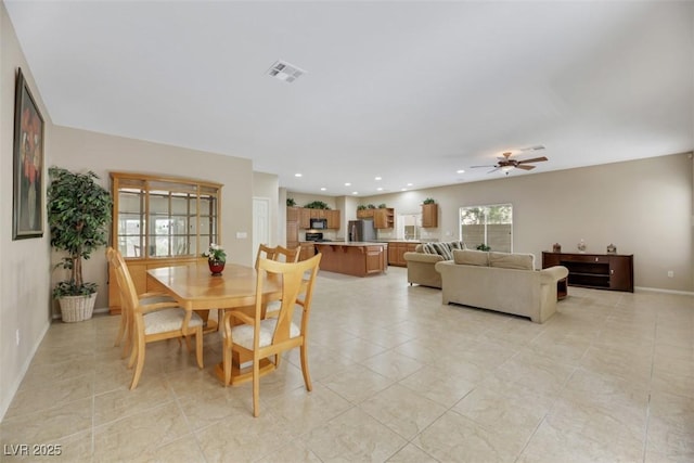 dining area featuring ceiling fan