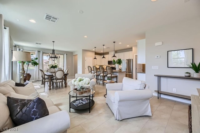 living room featuring a chandelier