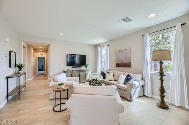 living room featuring light tile patterned floors