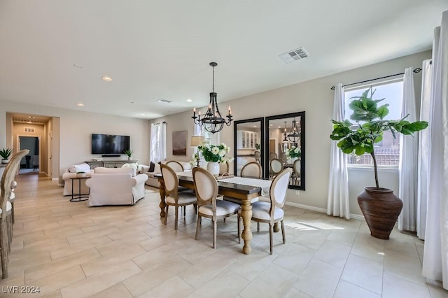 dining room featuring a chandelier