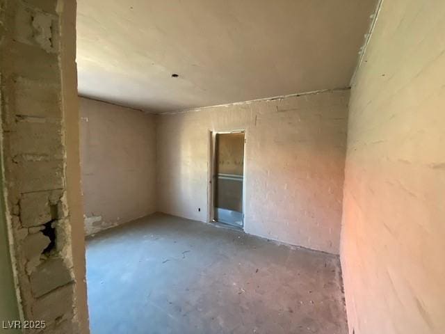 spare room featuring concrete floors