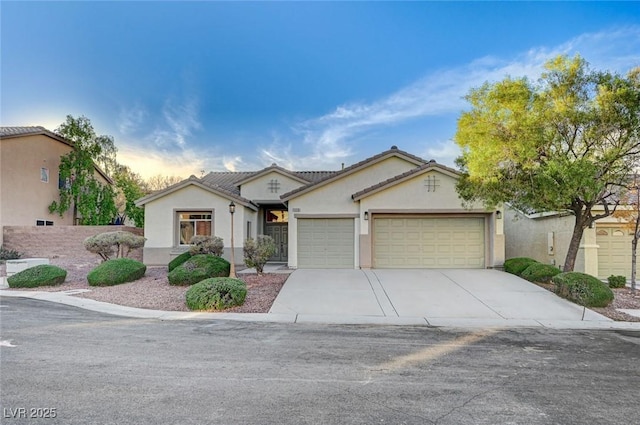 view of front of property with a garage