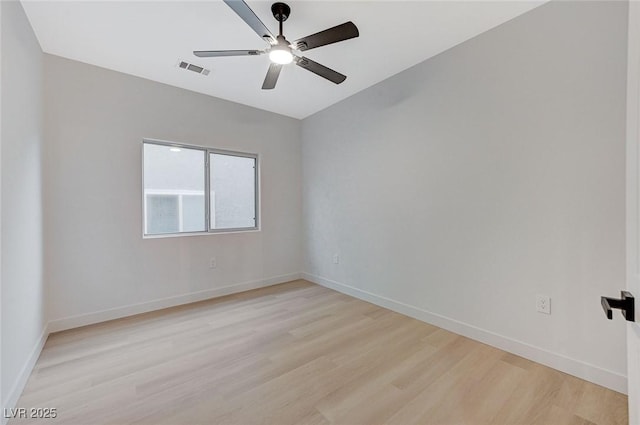 spare room with light hardwood / wood-style floors and ceiling fan