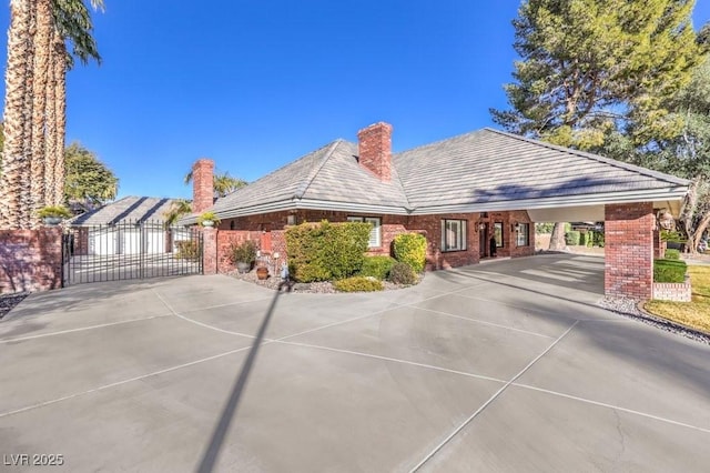 exterior space with a carport