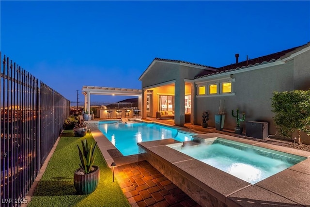 view of pool featuring area for grilling, an in ground hot tub, and a patio