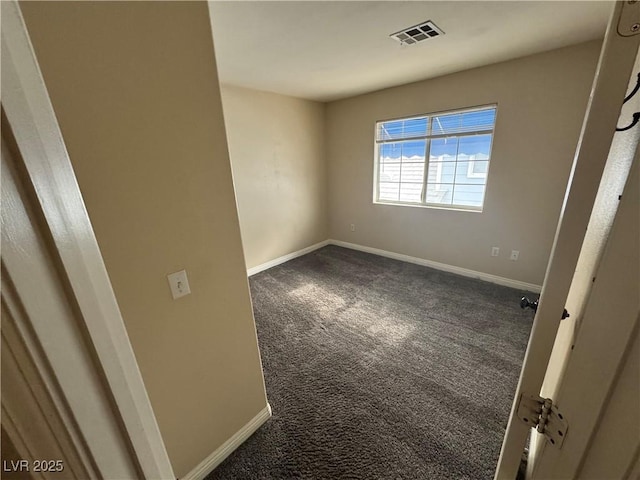 unfurnished room featuring carpet floors