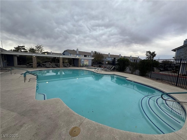 view of pool featuring a patio area