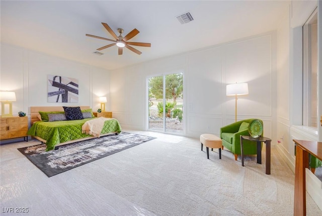 bedroom with ceiling fan, light carpet, and access to outside