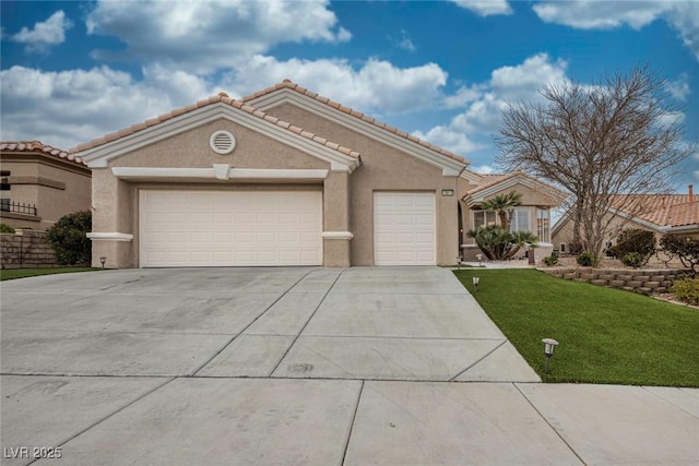 view of front of home featuring a garage and a front lawn