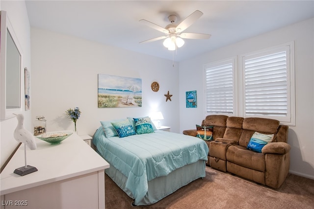 bedroom featuring ceiling fan and carpet