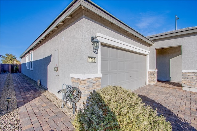 view of property exterior with a garage