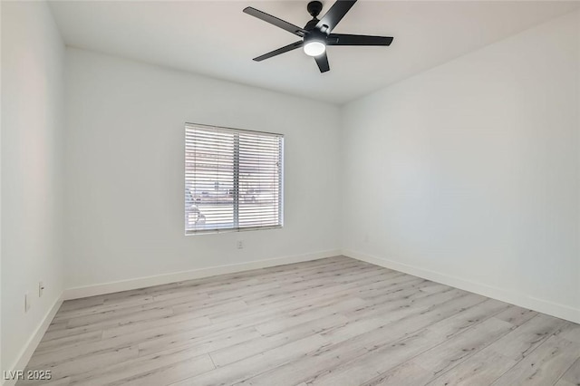 empty room with ceiling fan and light wood-type flooring