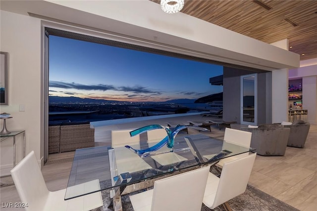 patio terrace at dusk with an outdoor kitchen