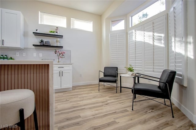 sitting room with light wood-type flooring