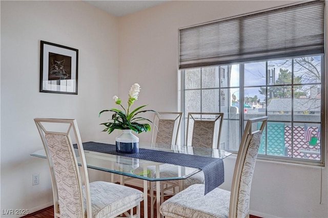 dining area featuring hardwood / wood-style flooring