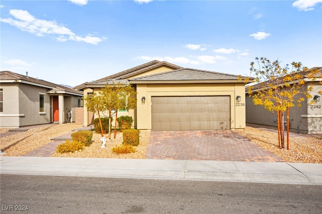 ranch-style home with a garage