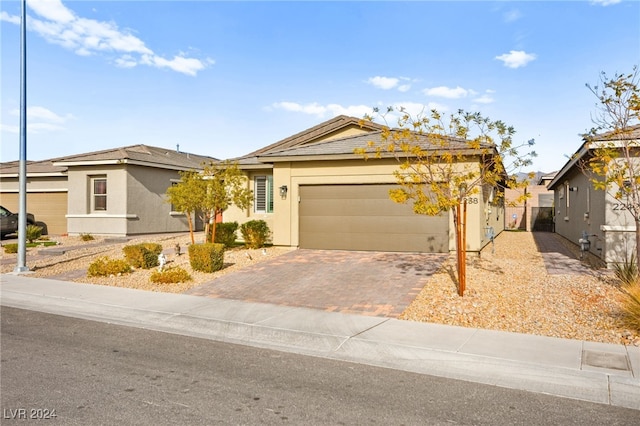 single story home with a garage