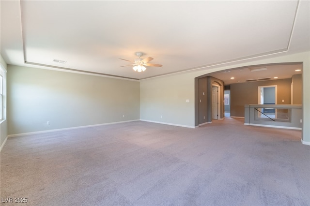 spare room featuring carpet flooring and ceiling fan