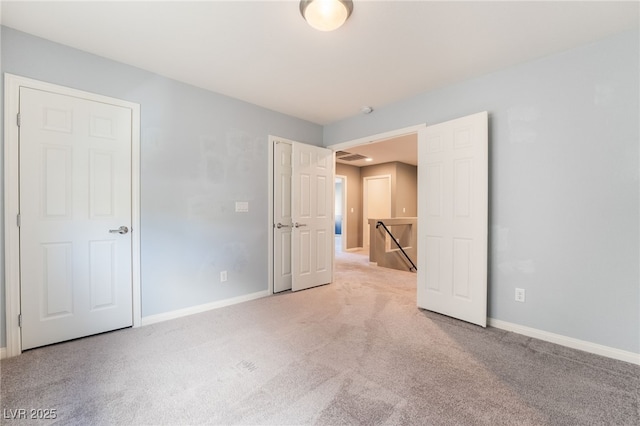 unfurnished bedroom featuring carpet flooring