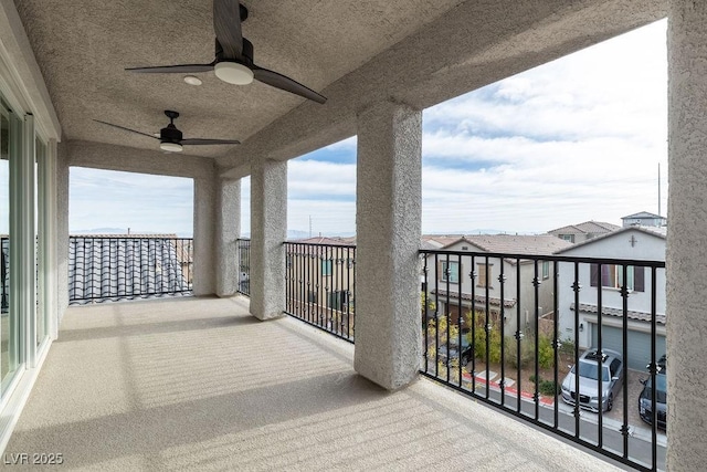 balcony featuring ceiling fan